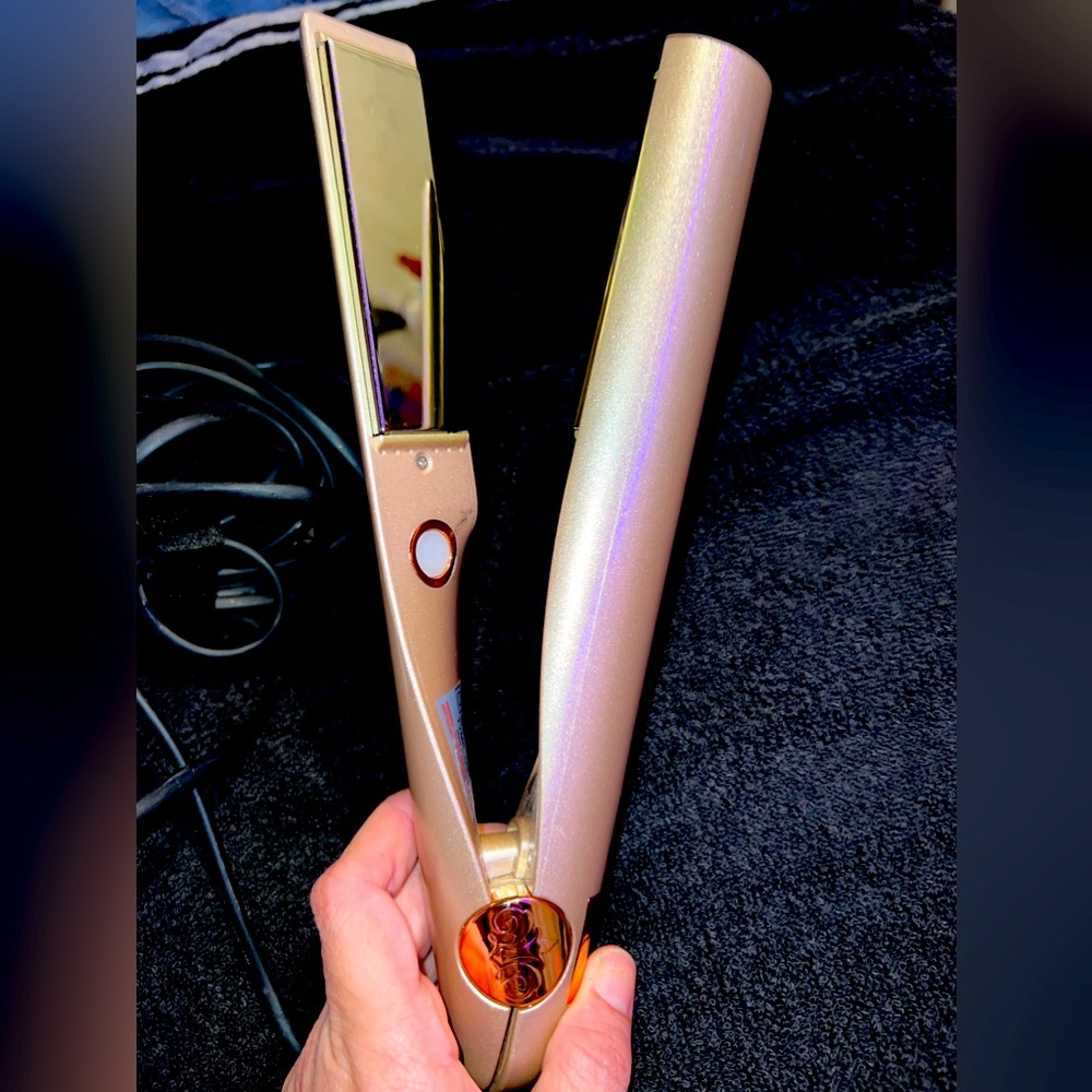 Rose gold Tyme iron pro 2 in 1.